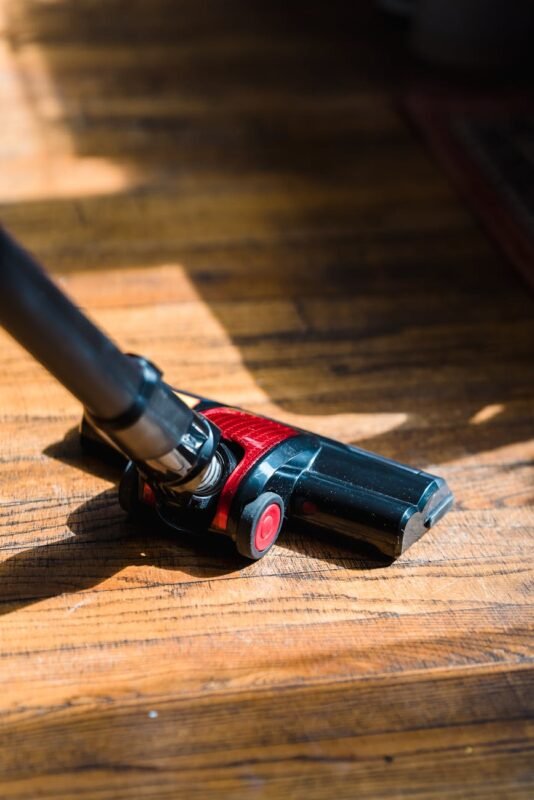 close up of a person cleaning the floor